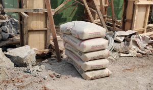 Bahan Material Semen yang di gunakan diduga tidak sesuai RAB